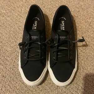 Black sperry tennis shoe